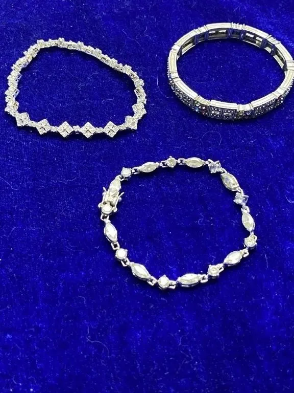 Three Silver-Tone Crystal Bracelets