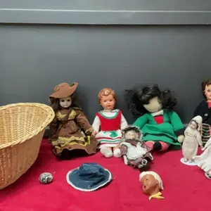 VINTAGE DOLLS IN WICKER BASKET
