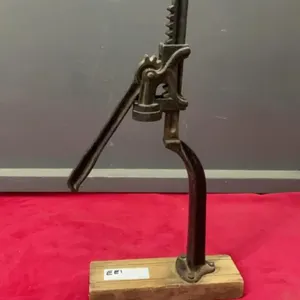 VINTAGE CAST BOTTLE CORKER ON WOOD BASE