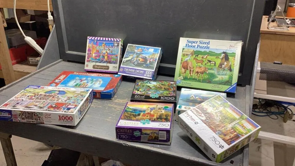 CRATE W/ASSORTED PUZZLES