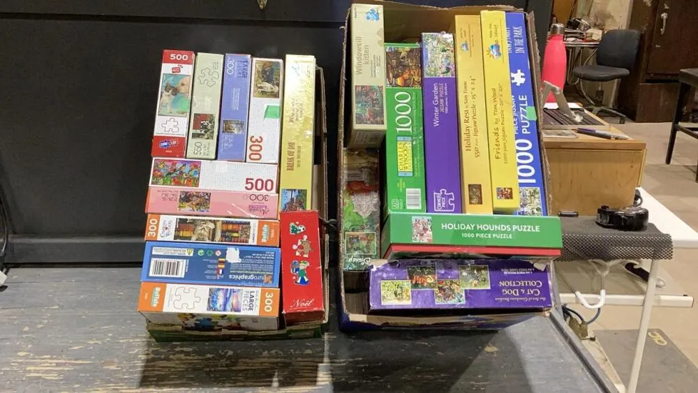 (2)BOXES OF PUZZLES