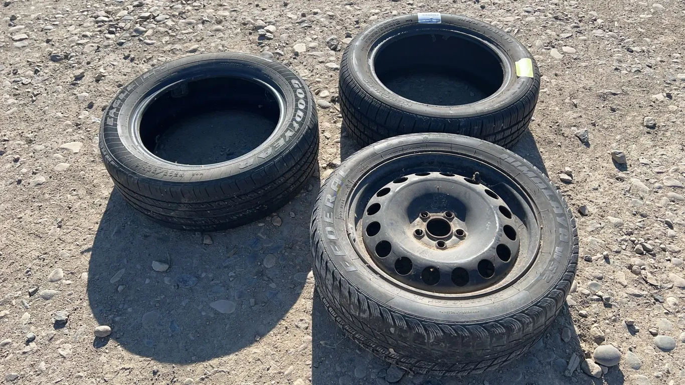 3 - 205/55R16 Tires W/ 1- 16" Rim