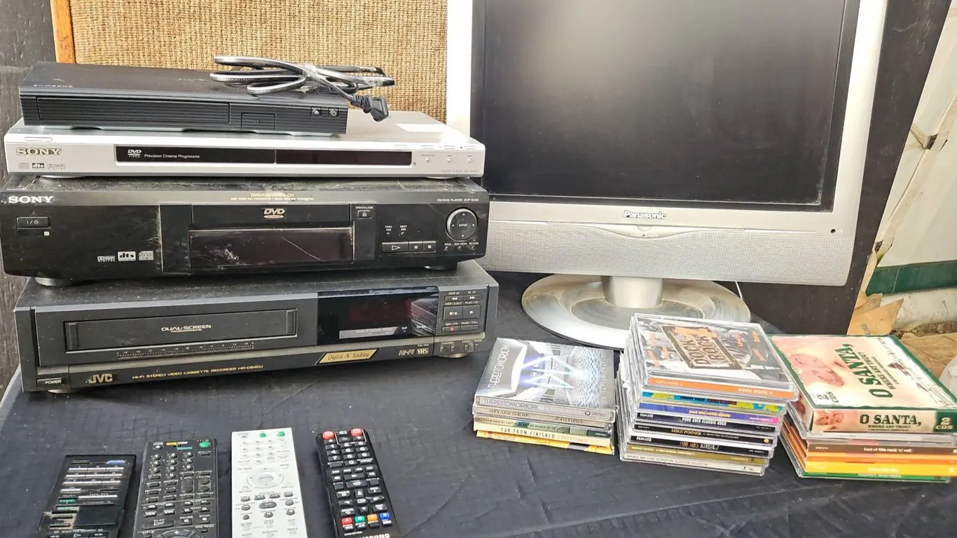 Panasonic VIERA Monitor, Sony DVD Players, JVC VHS Player, Remotes, 18 CD'S