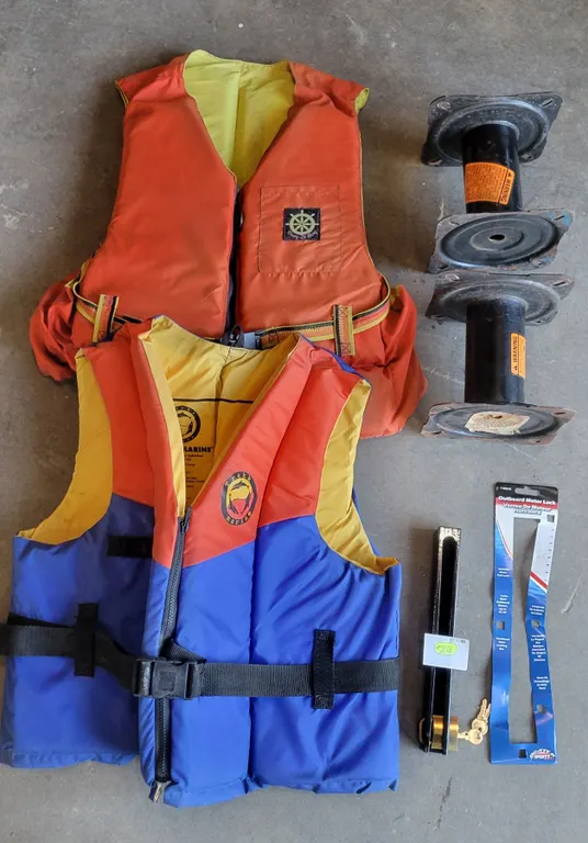 Large Life jackets (x2), boat seat risers (x2), Outboard Motor Lock