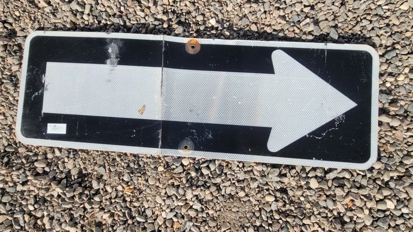 Black “One Way” Sign – 12”x 36”