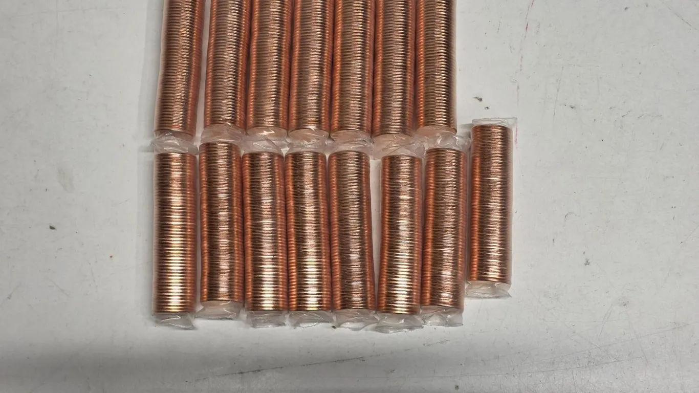 15 rolls of canadian pennies- 2011- magnetic