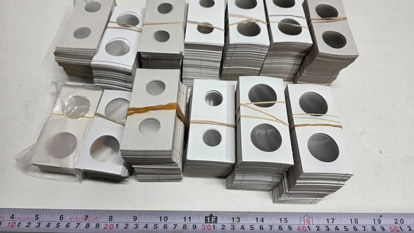Over 1000 2x2 coin holders