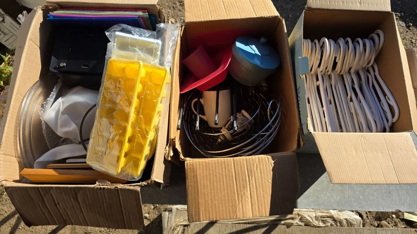 3 boxes of misc items- Hangers