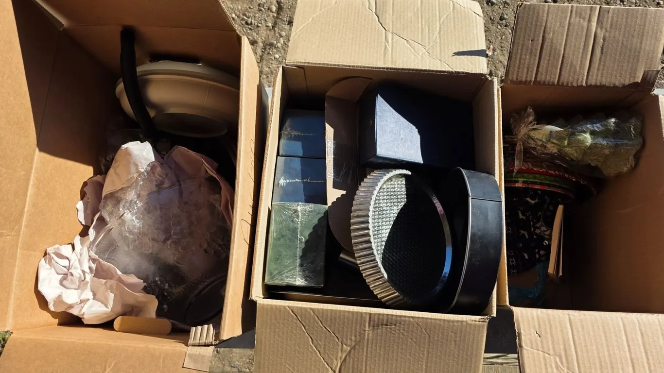 3 boxes of misc items- hangers