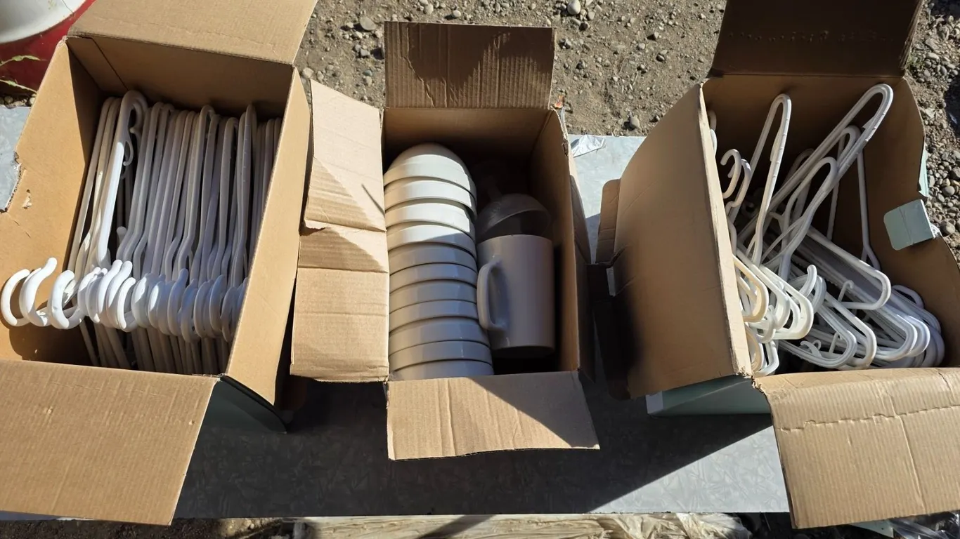 3 boxes of misc items- binders