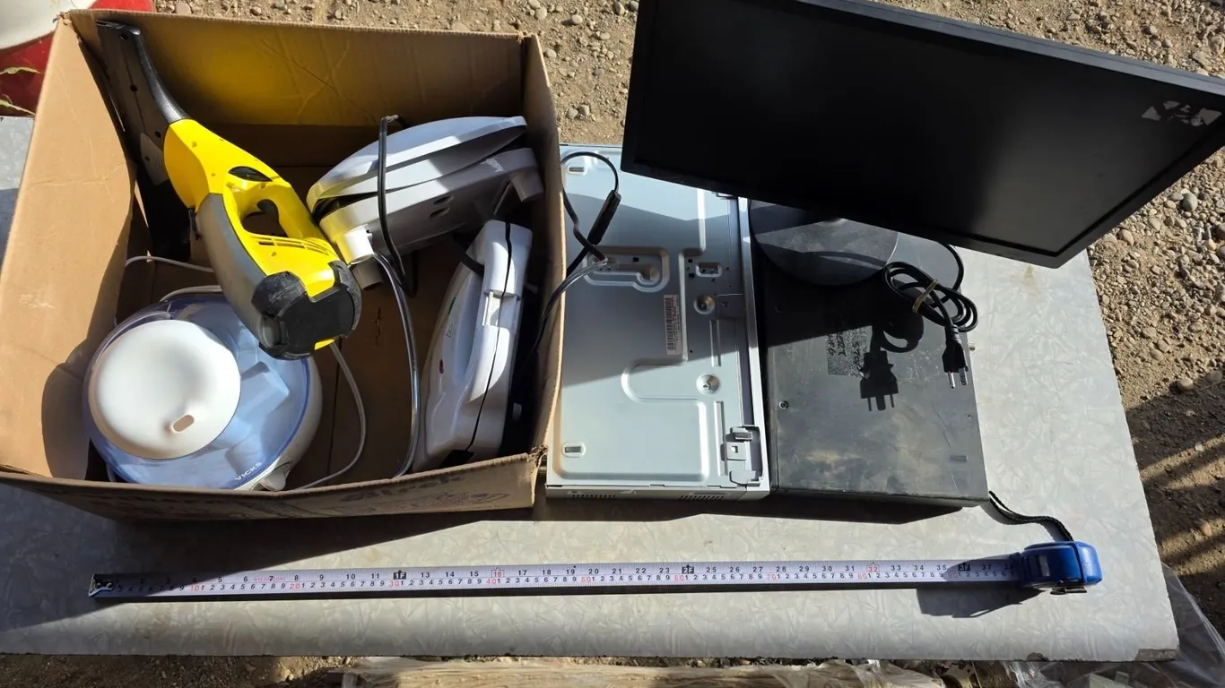 Lot of misc items- moniters, electronics