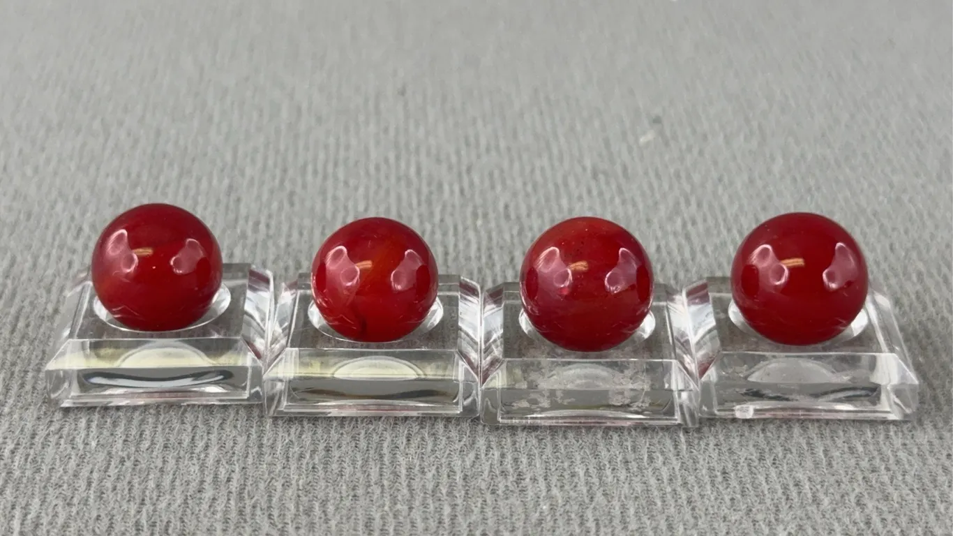 4 Red Slag Glass Marbles, Appr. 1/2” D