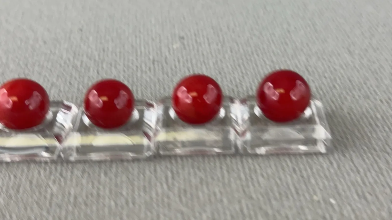 4 Red Slag Glass Marbles, Appr. 1/2” D