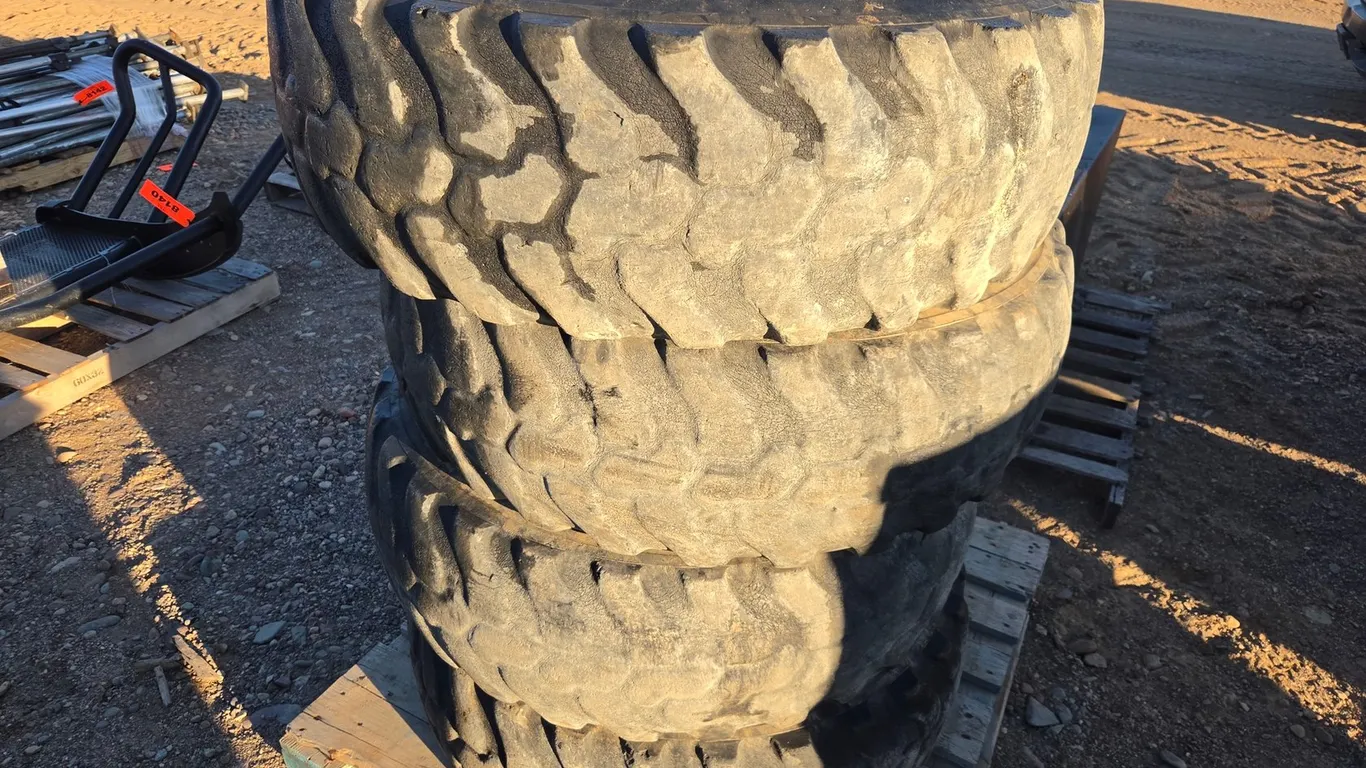 (4) Dunlop 335/80R18 Tires