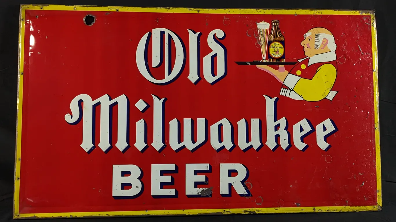 EMBOSED TIN SIGN OLD MILWAUKEE BEER (SCHLITZ WISCONSIN)