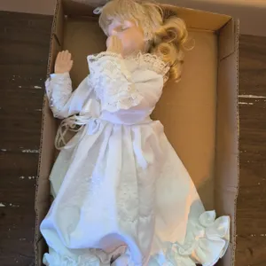 Praying Porcelain Doll