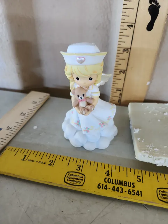2004 Precious Moments "Always Bears The Gift Of Love" Figure