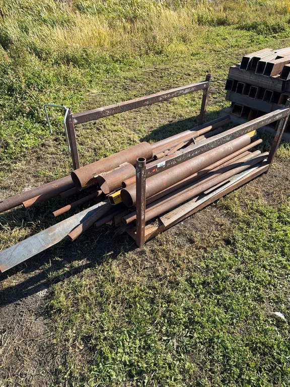 Steel rack c/w misc tubing and flat iron