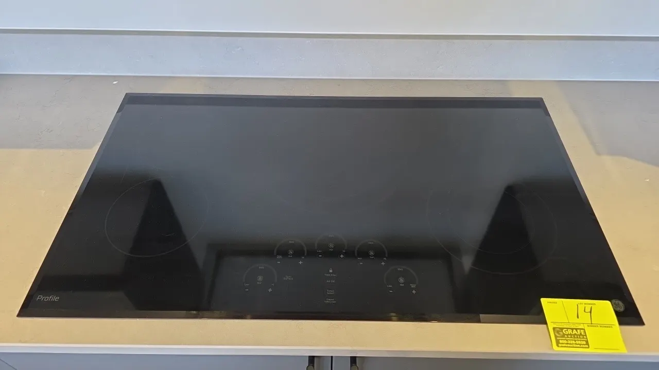 GE Profile PP9036DJ2BB built-in electric glass cooktop. Features 5 radiant cooking elements, digital touch controls, sync burner capability, and power