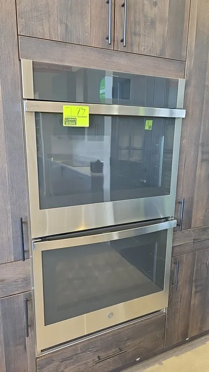 GE Profile PTD7000SN3SS 30" built-in double wall oven. Features stainless steel construction, glass door fronts, Wi-Fi Connect display, convection fan