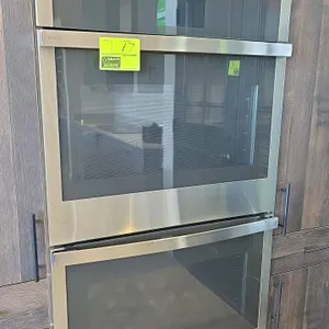 GE Profile PTD7000SN3SS 30" built-in double wall oven. Features stainless steel construction, glass door fronts, Wi-Fi Connect display, convection fan