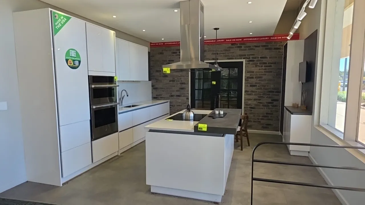 Infinity Plus kitchen cabinet package. Includes upper and lower wall cabinets (175" x 97"H) with solid surface countertop, stainless steel dual sink,