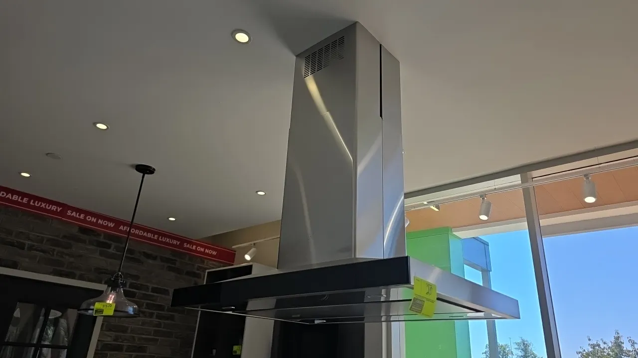 JennAir JXI8536HS1 stainless steel hood vent. Features electronic touch controls with multi-speed settings and boost mode, integrated lighting, remova