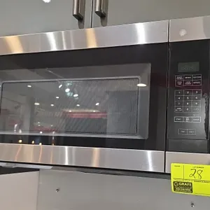 2021 Whirlpool AMV2307PFS07 built-in microwave oven. Features stainless steel trim, digital keypad display, interior glass turntable, and integrated u