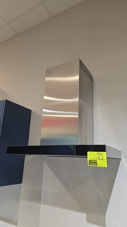 JennAir JVR0430HS0 stainless steel range hood vent. Features chimney-style enclosure, front touch controls with multi-speed fan settings, dual LED lig