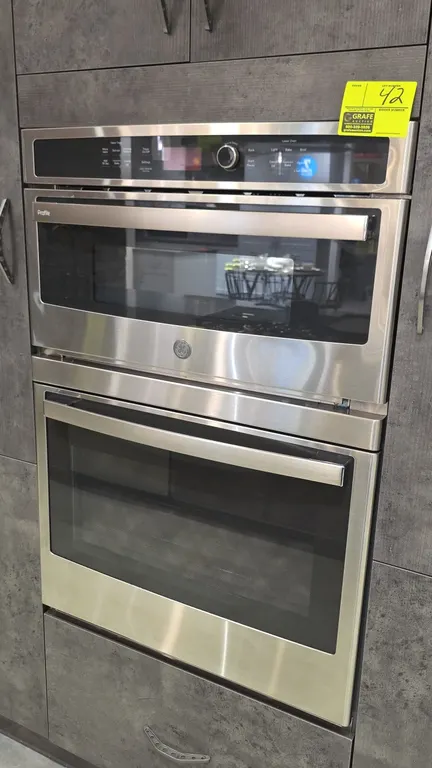 2022 GE Profile PT7800SH9SS 30" built-in combination microwave wall oven. Features upper microwave/convection oven with glass turntable and wire rack,