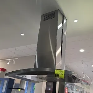 GE Profile PV977N3SS stainless steel island range hood vent. Features push-button controls, four integrated lights, removable mesh grease filter, and 
