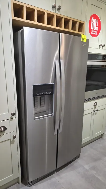 2022 Whirlpool WRS571CIHZ04 side-by-side refrigerator. Features stainless steel finish, exterior ice and water dispenser with digital display, In-Door