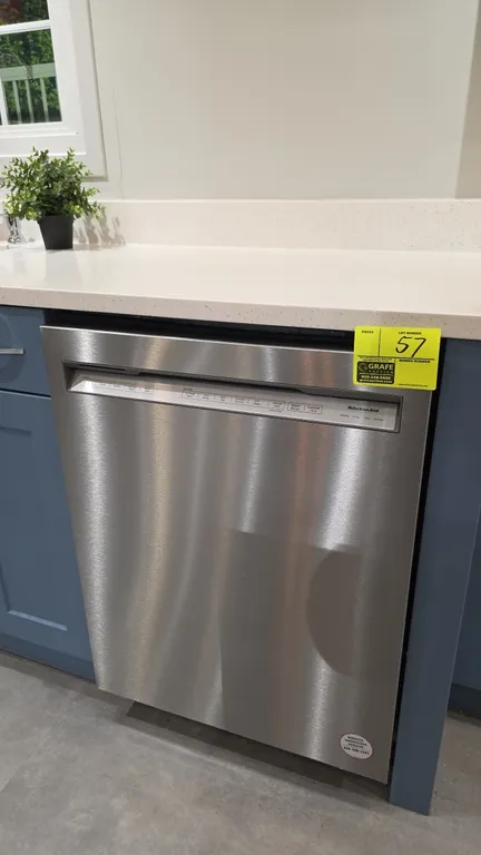 KitchenAid KDFM404KPS0 built-in dishwasher. Features stainless steel finish and interior tub, pocket handle with front cycle controls, tiered racks, a