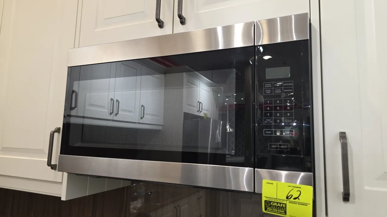 2021 Whirlpool AMV2307PFS07 over-the-range microwave oven. Features stainless steel and black glass finish, digital touchpad controls, glass turntable