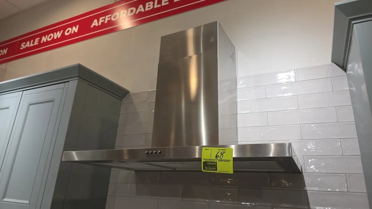 Whirlpool WVW57UC6FS3 stainless steel range hood vent. Features push-button controls, 3-speed fan settings, LED cooktop lighting, stainless chimney, a