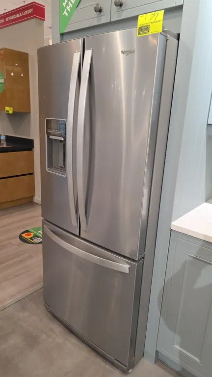 2022 Whirlpool WRF560SEHZ02 French door refrigerator. Features stainless steel finish, exterior door water dispenser, adjustable interior glass shelvi