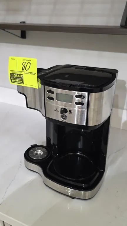Hamilton Beach 49980R 12-cup coffee maker. Features stainless steel front accents, dual single-serve and carafe brew options, digital programmable con