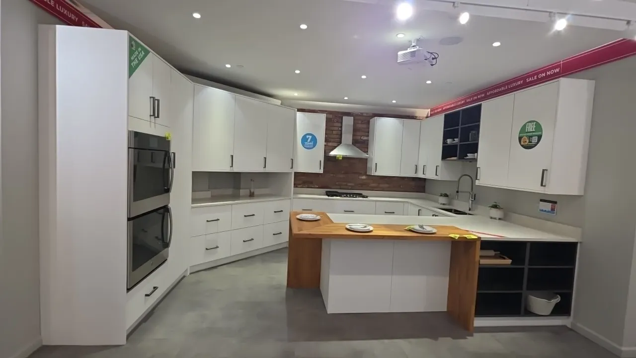 Infinity Plus kitchen cabinet set. Features 84" x 87" x 111" U-shape upper and lower cabinets with solid surface countertops, stainless steel sink wit