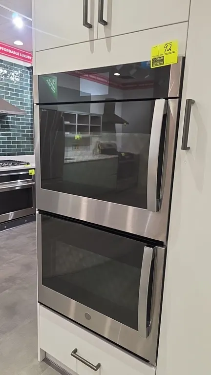 GE Profile PTD700LSN1SS built-in double wall oven. Features stainless steel finish, right-swing glass doors, touchscreen display with Wi-Fi Connect, a
