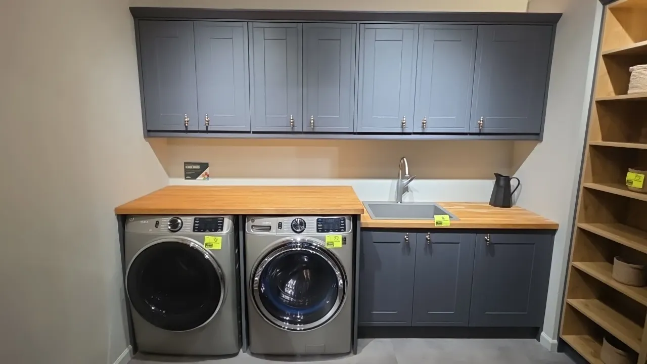 Infinity Plus upper and lower kitchen cabinets. Includes 117"L upper and lower cabinet run, solid wood countertops, sink with faucet, and 70" x 93" wo