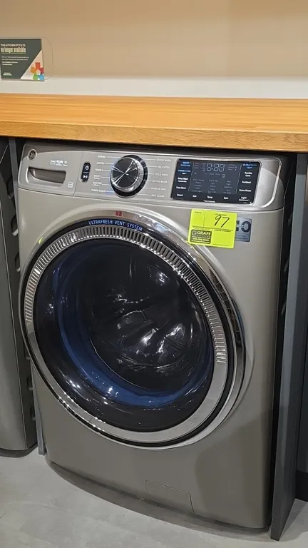 GE GFW650SPN2SN front load washer. Features UltraFresh Vent System, Microban door gasket, SmartDispense, PowerSteam, Wi-Fi capability, and stainless s