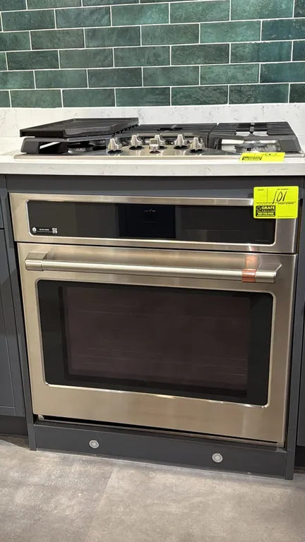 Café CTS70DP2N2S1 30" single wall convection oven. Features stainless steel finish with accent bar handle, Wi-Fi Connect capability, glass viewing doo