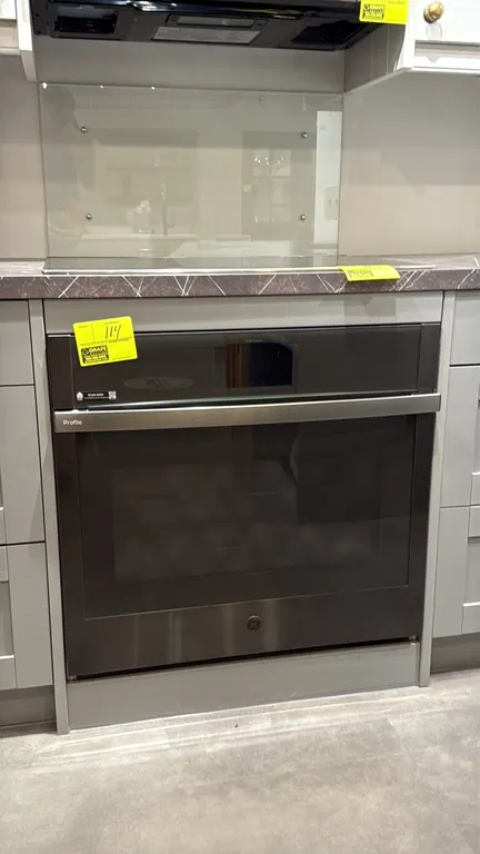 GE Profile PTS7000BN2TS smart built-in convection single wall oven. Features No Preheat Air Fry, precision cooking, and interior wire racks. 30"W. S/N