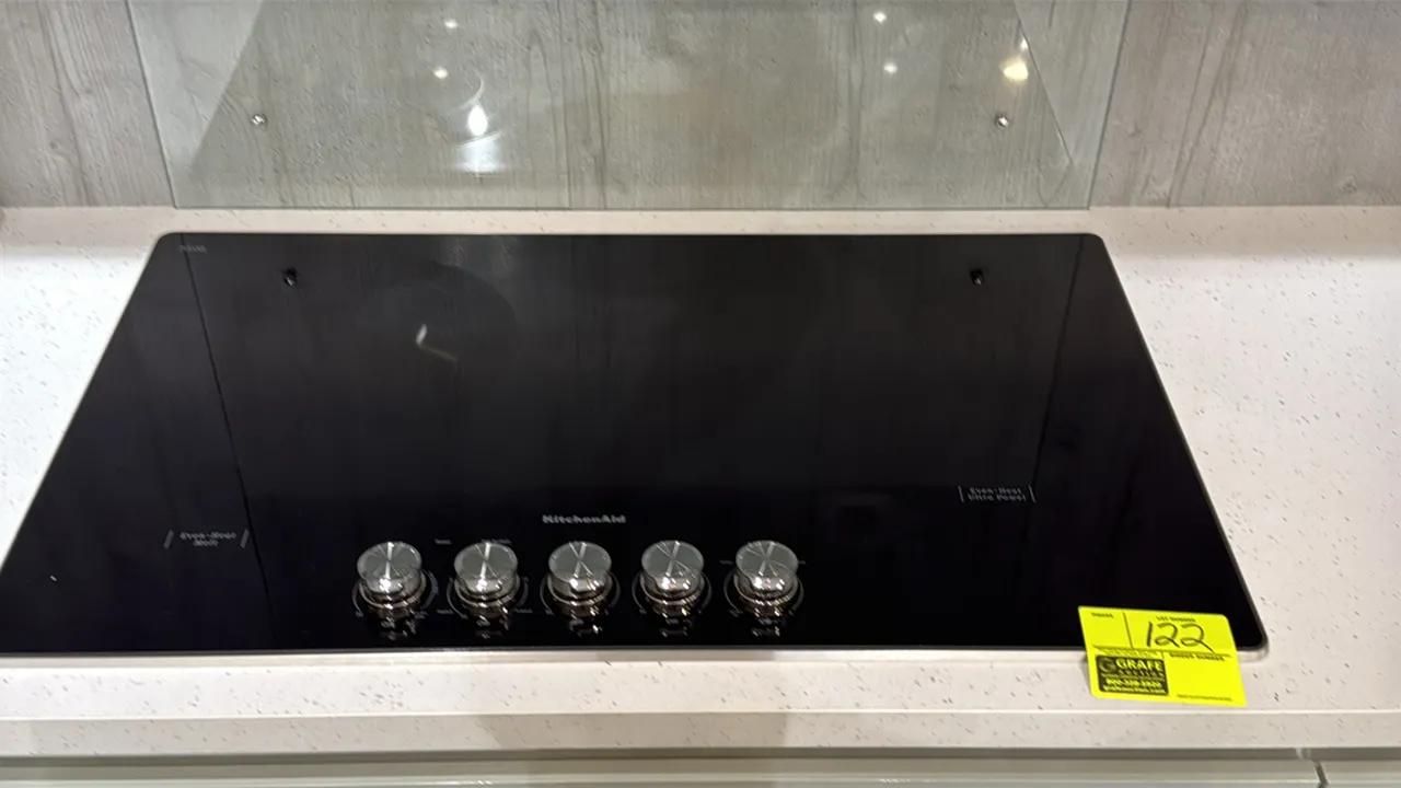 KitchenAid KCES556HSS00 36" built-in electric cooktop. Features 5 radiant elements, Schott Ceran smooth ceramic glass surface, front-mounted knob cont