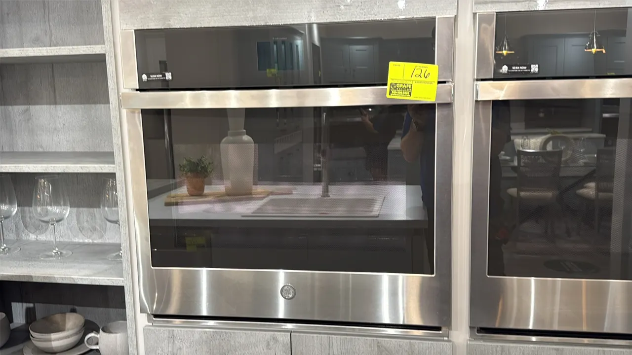 GE JTS5000SN1SS 30" built-in convection wall oven. Features stainless steel finish, glass viewing window, Wi-Fi Connect capability, and interior racks