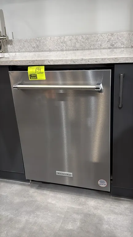 KitchenAid KDTM604KPS0 stainless steel undercounter dishwasher. Features top electronic controls, stainless steel interior tub, three racks including