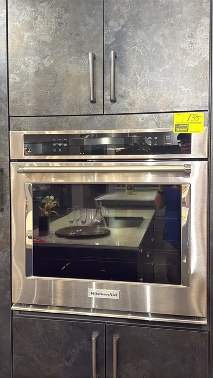 KitchenAid KOSE500ESS04 30" built-in single wall convection oven. Features stainless steel exterior, glass door, digital touch controls, blue porcelai