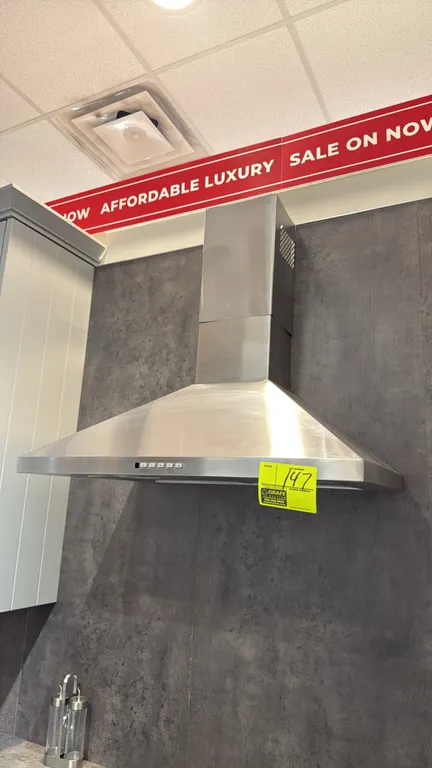 GE JVW5301SJ1SS 30" wall-mount chimney range hood. Features stainless steel construction, push-button controls, 3 fan speeds with boost function, dual