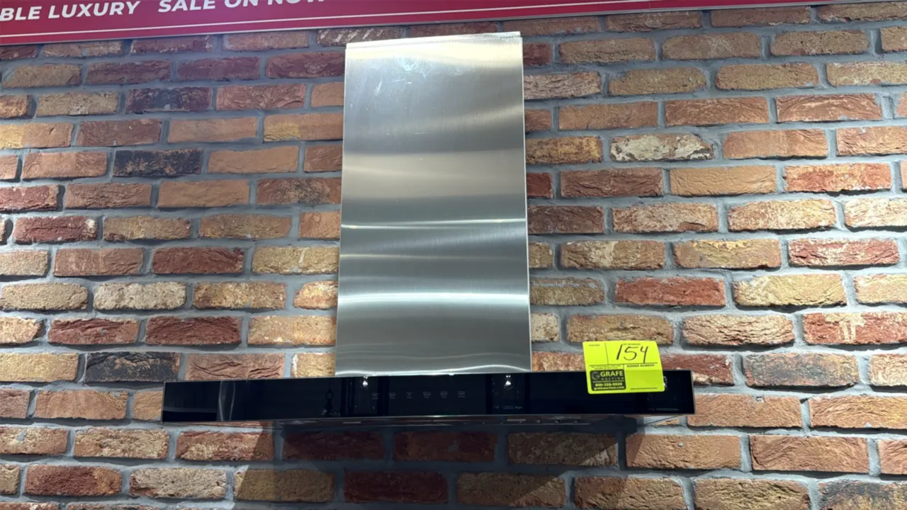2011 JennAir JVR0430HS0 wall-mounted chimney range hood. Features stainless steel construction, black glass control panel with electronic touch contro