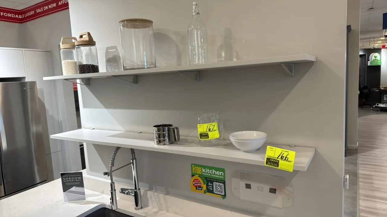 Wall-mounted shelves. Includes (2) shelves with mounting brackets. White finish. 63"L. Wall mounted. Contents not included.